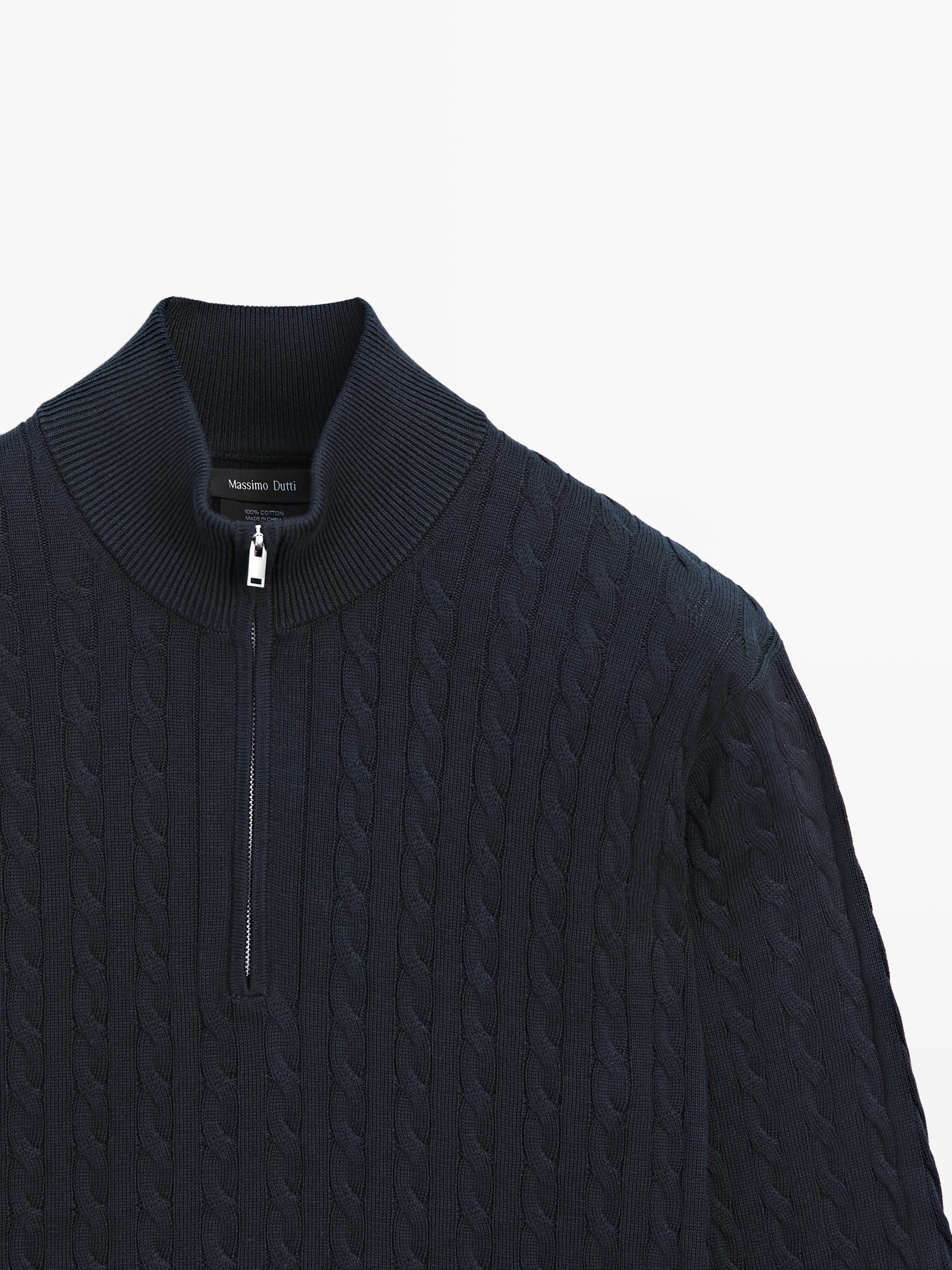 Pull en maille col montant zippé